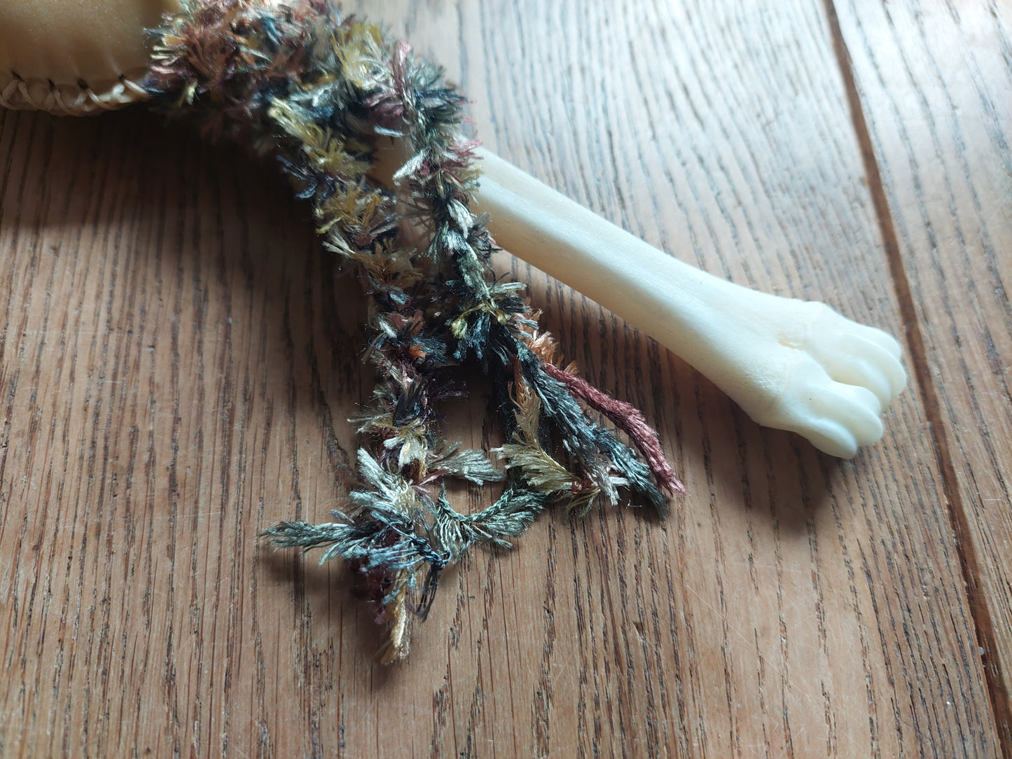 Goat hide and roe deer leg bone rattle