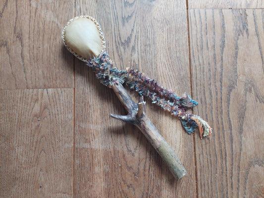 Goat hide and pine wood rattle