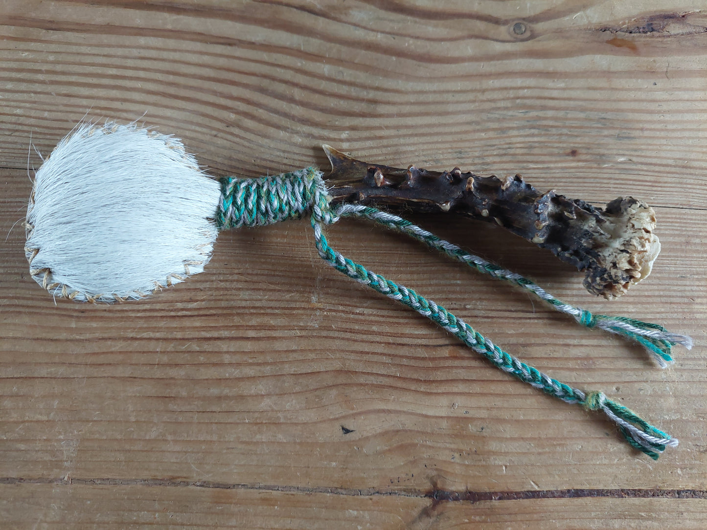 Horse hide and roe deer antler rattle