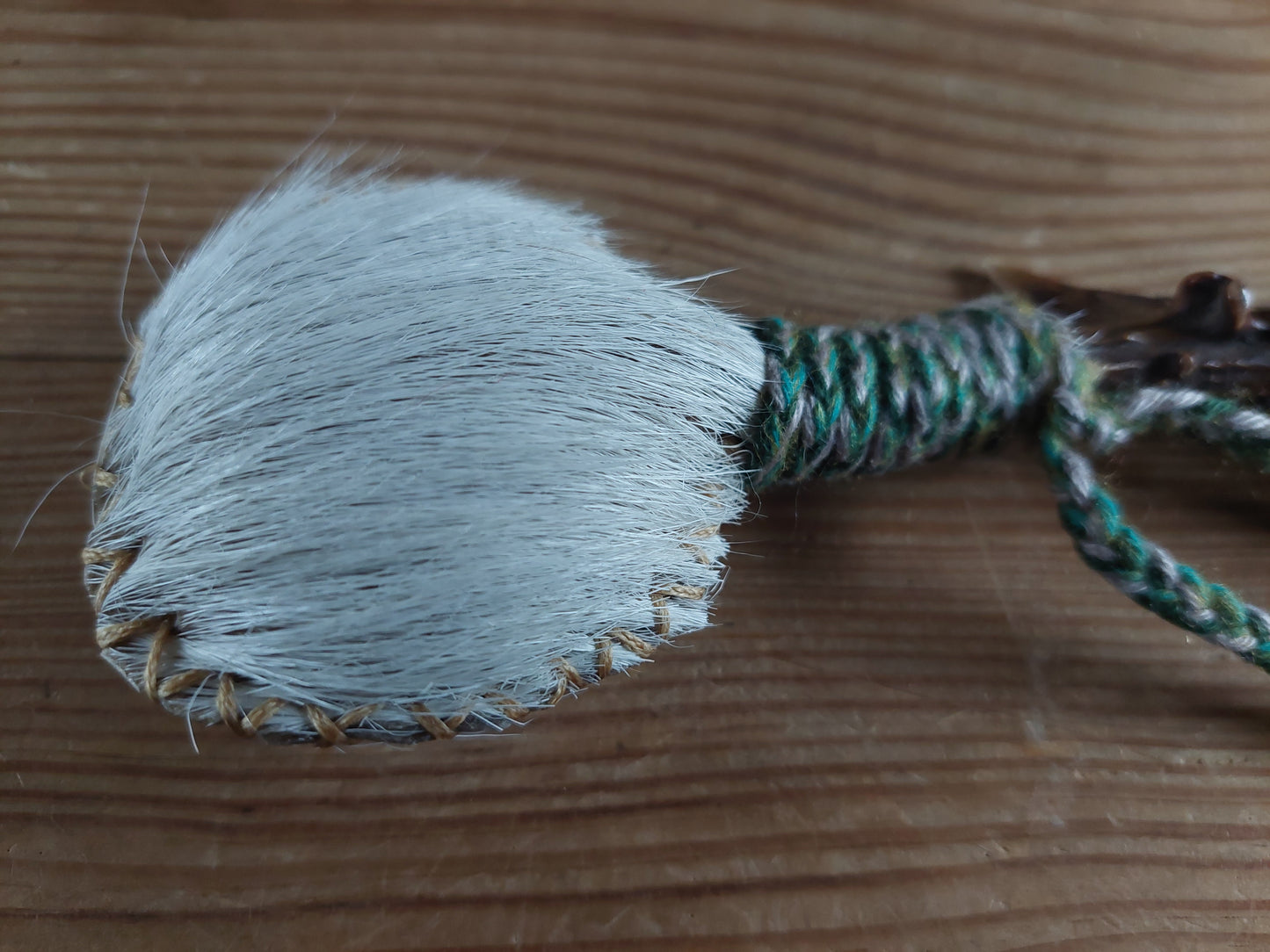 Horse hide and roe deer antler rattle