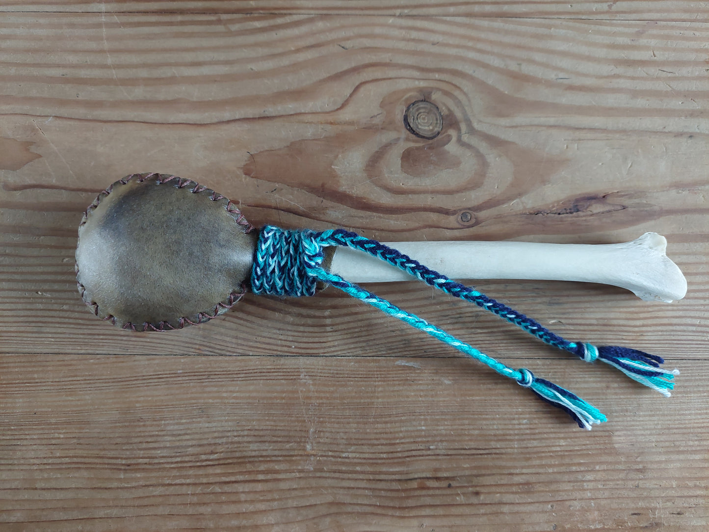 Yak hide and red deer leg bone rattle