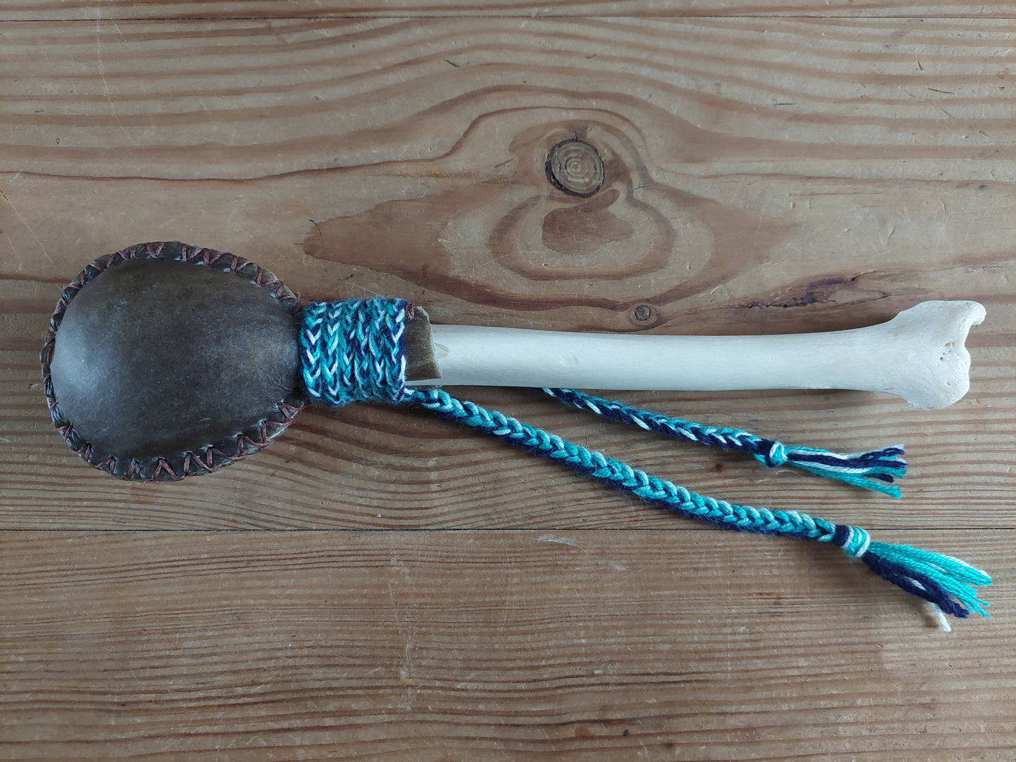 Yak hide and red deer leg bone rattle