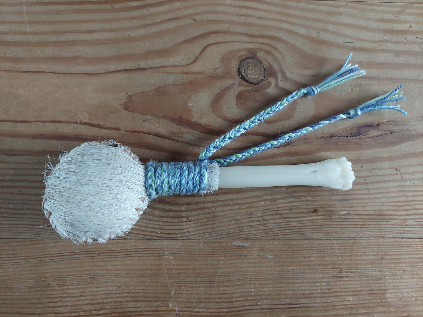 Horse hide and roe deer leg bone rattle