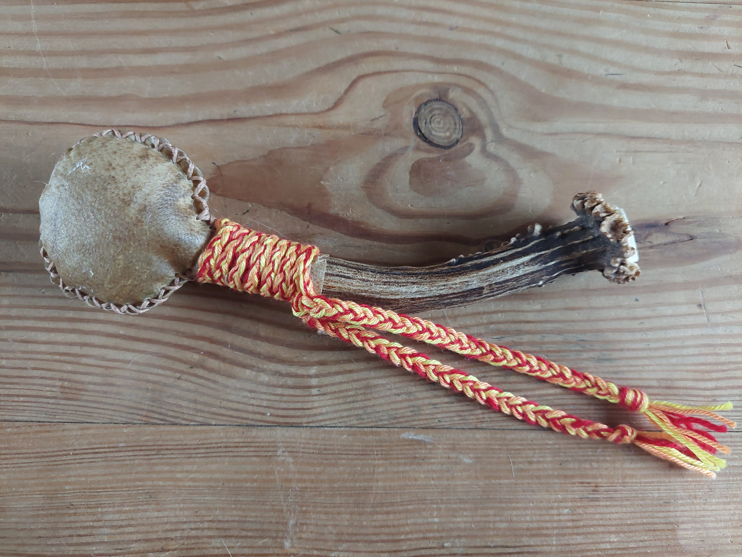Goat hide and roe deer antler rattle