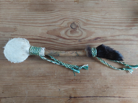 Horse hide, badger paw and pine wood rattle