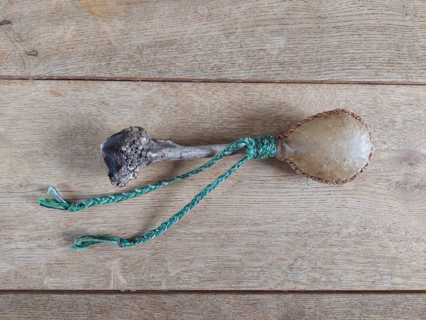 Goat hide and roe deer antler rattle