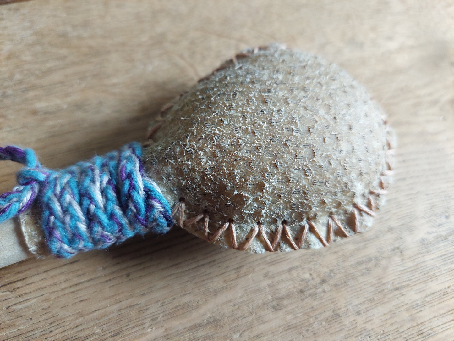 Wild boar hide and roe deer leg bone rattle