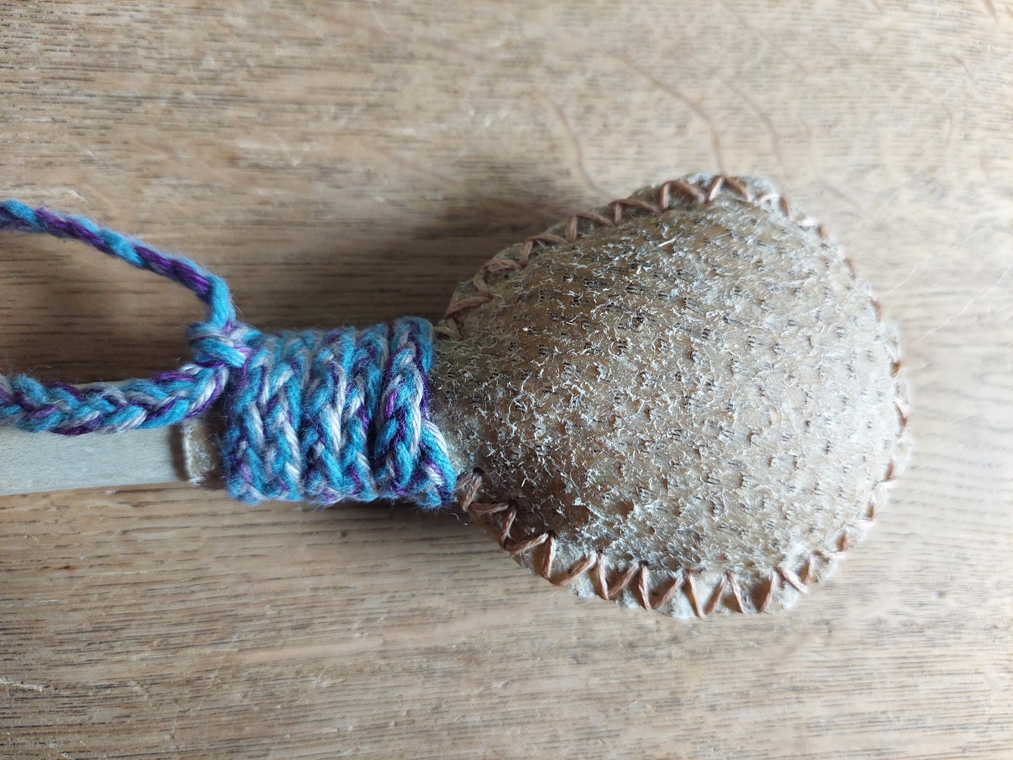 Wild boar hide and roe deer leg bone rattle
