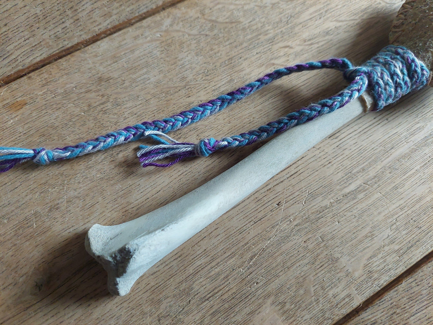 Wild boar hide and roe deer leg bone rattle