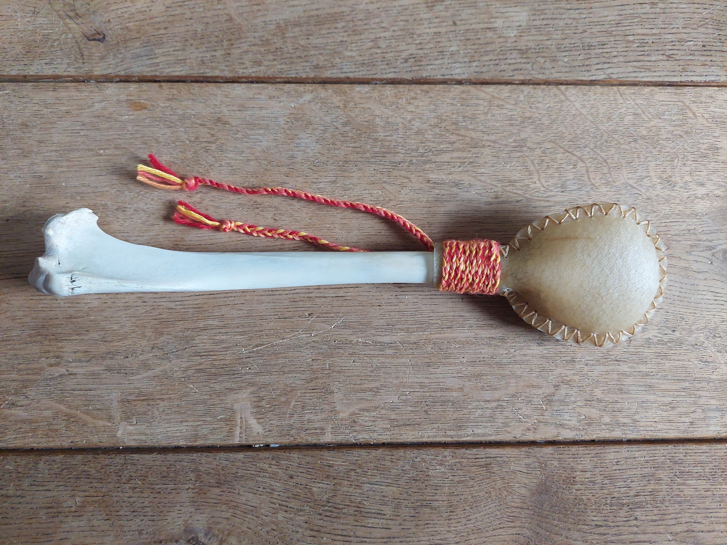 Red deer hide and red deer leg bone rattle