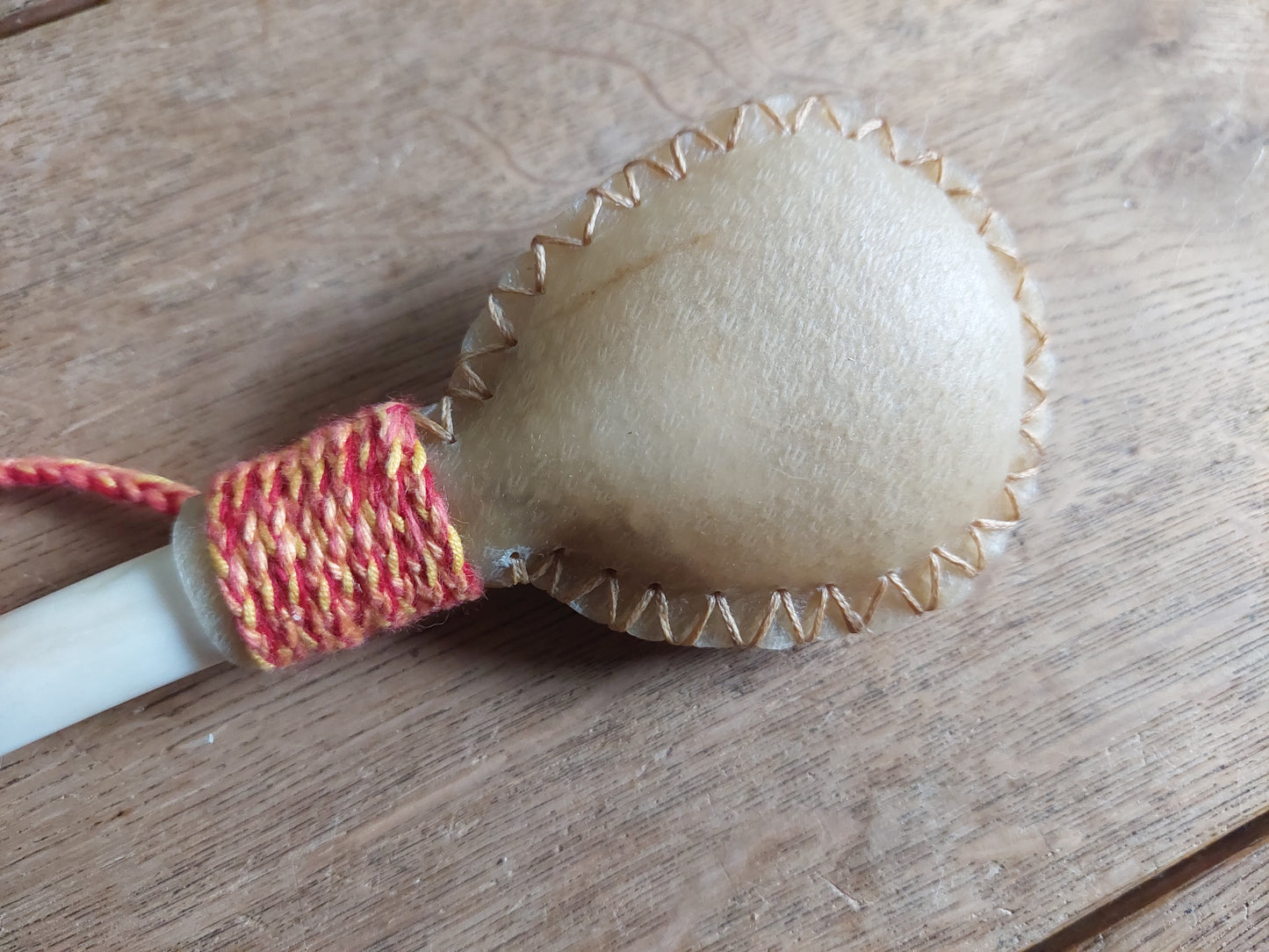 Red deer hide and red deer leg bone rattle