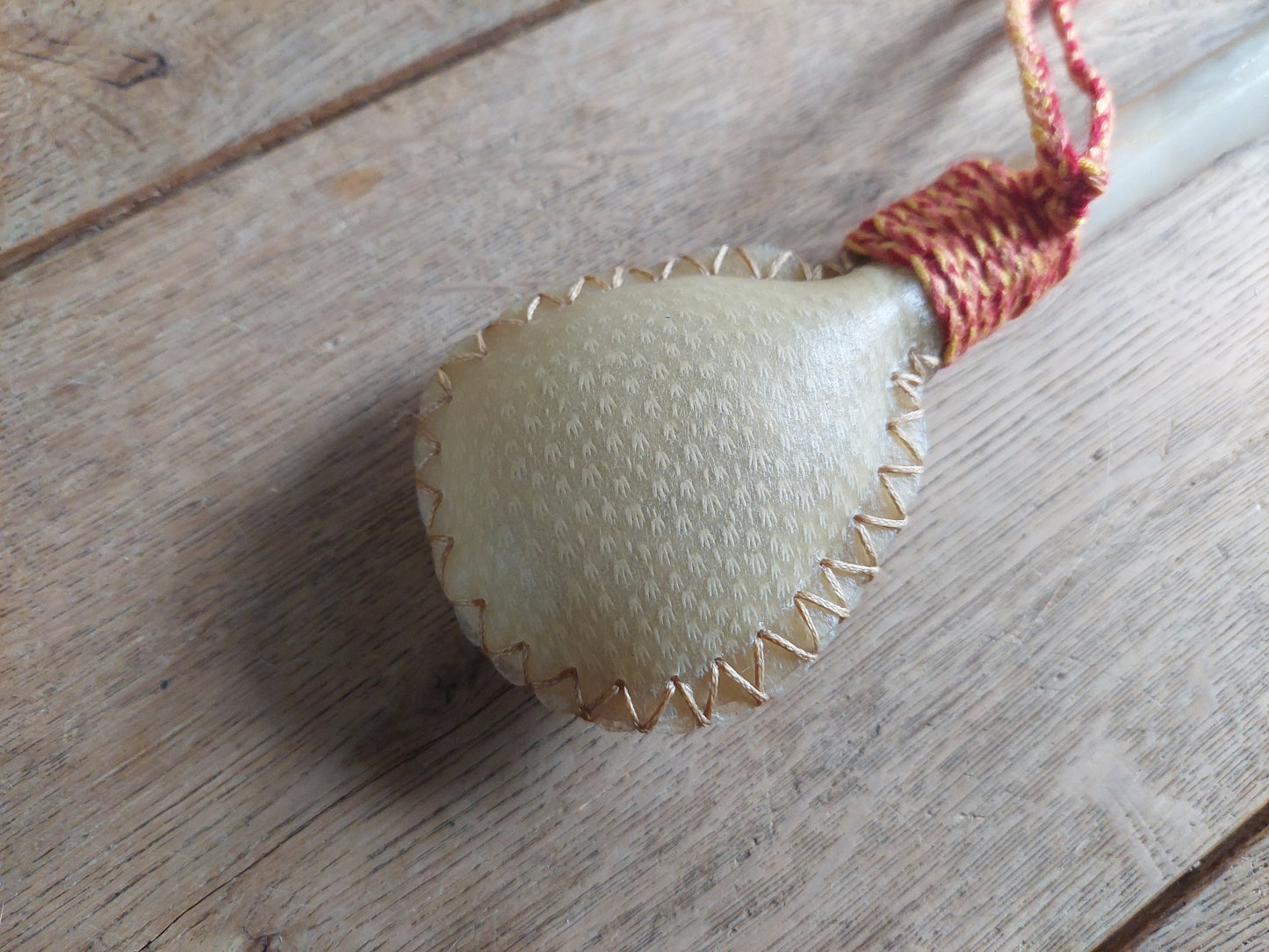 Red deer hide and red deer leg bone rattle
