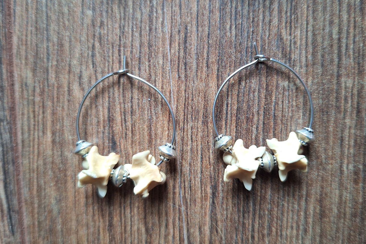 Snake vertebrae amulet earrings
