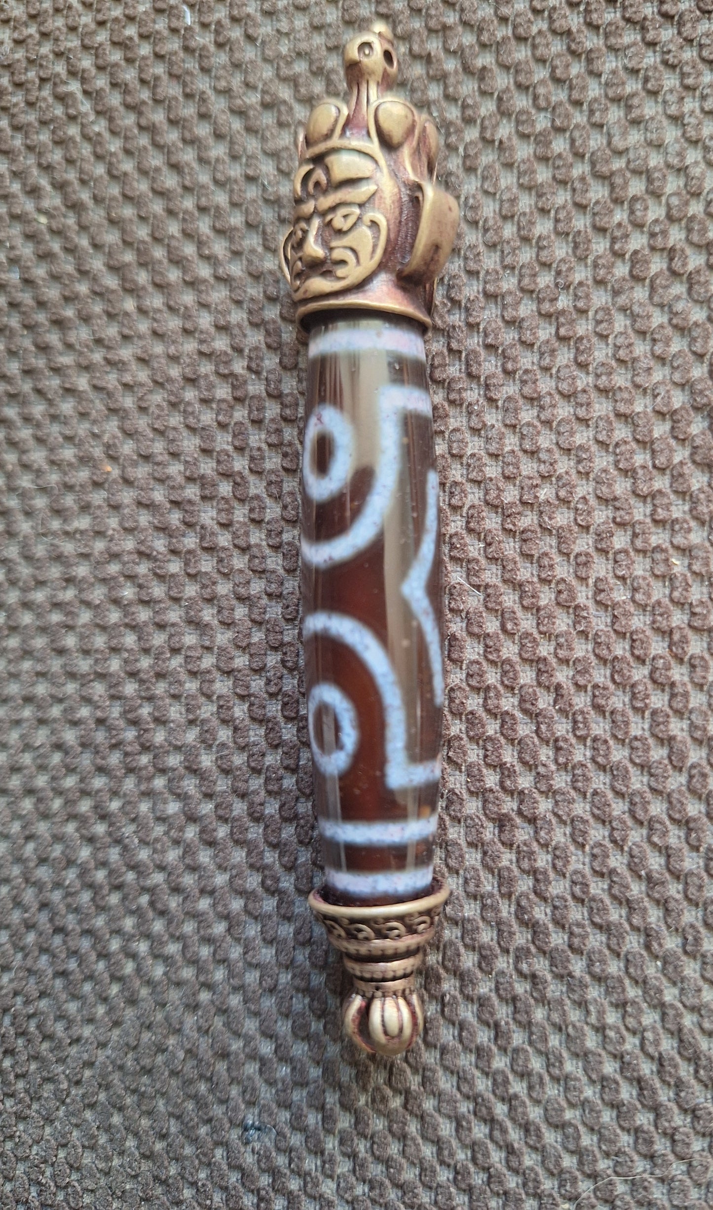 3 eye dzi bead and Hayagriva pendant