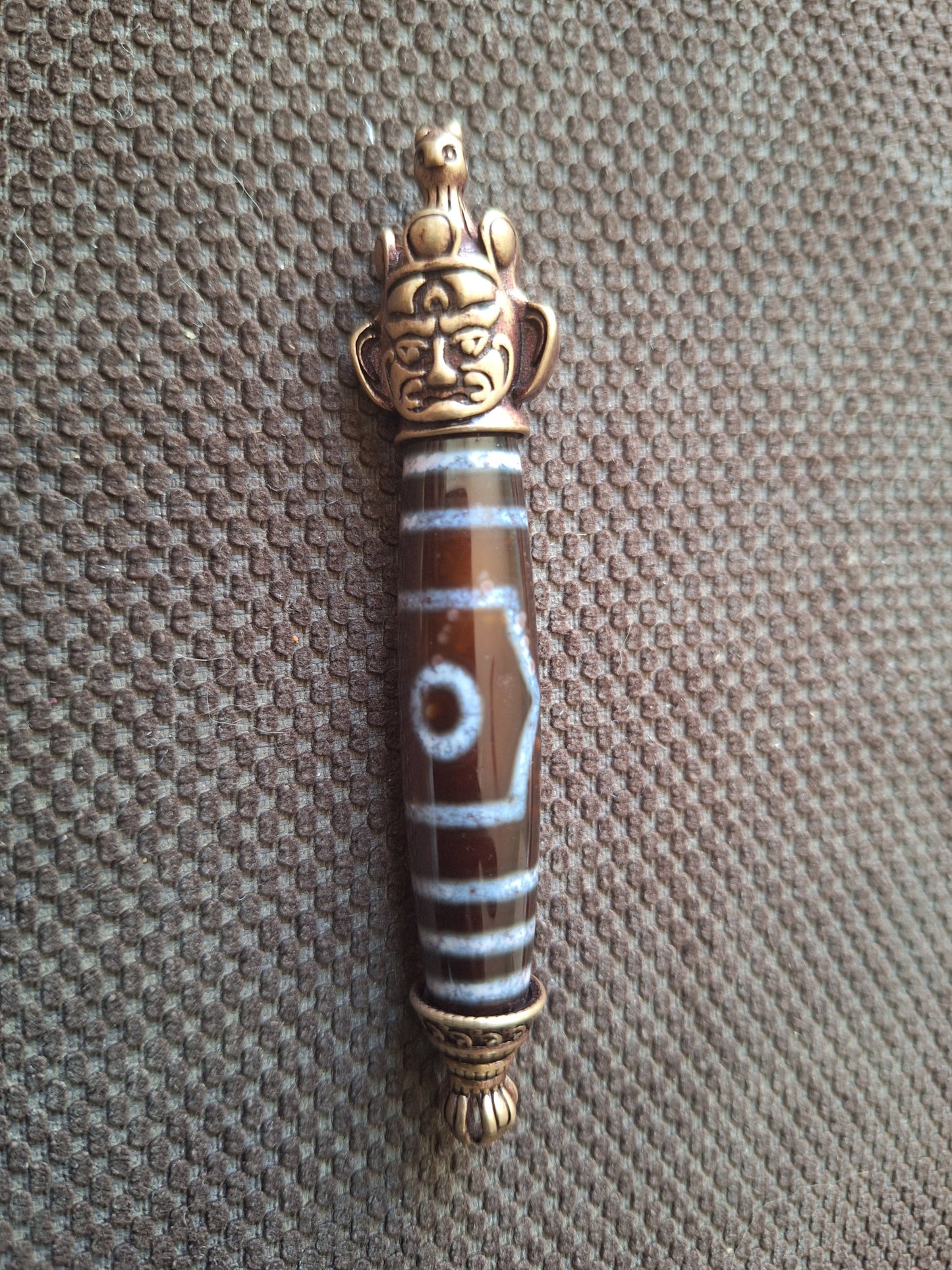 3 eye dzi bead and Hayagriva pendant