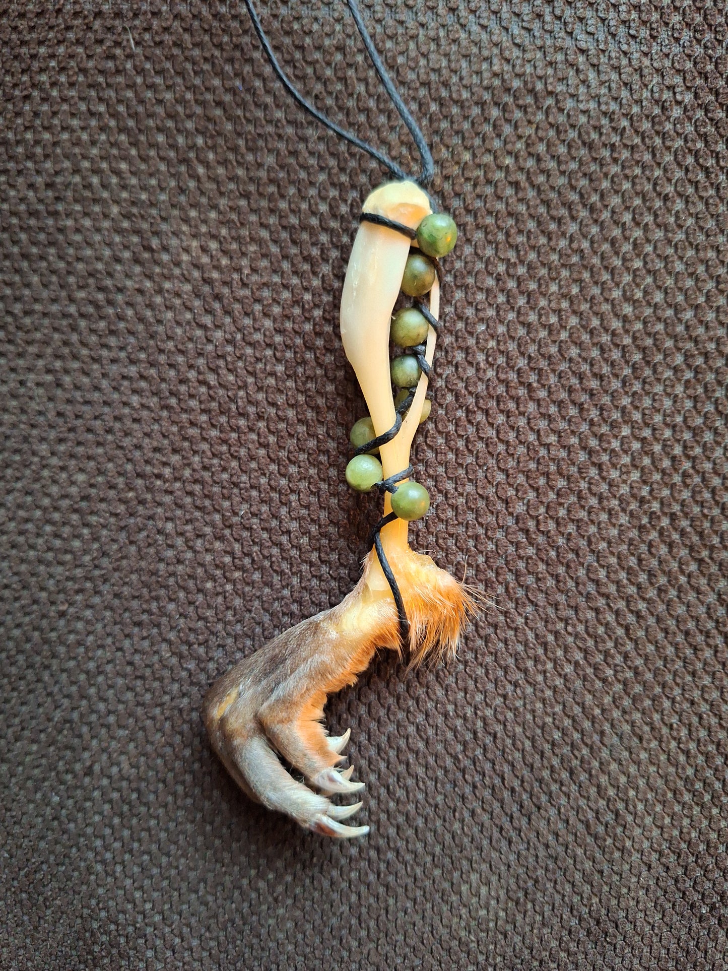 Musk rat paw and jade amulet necklace