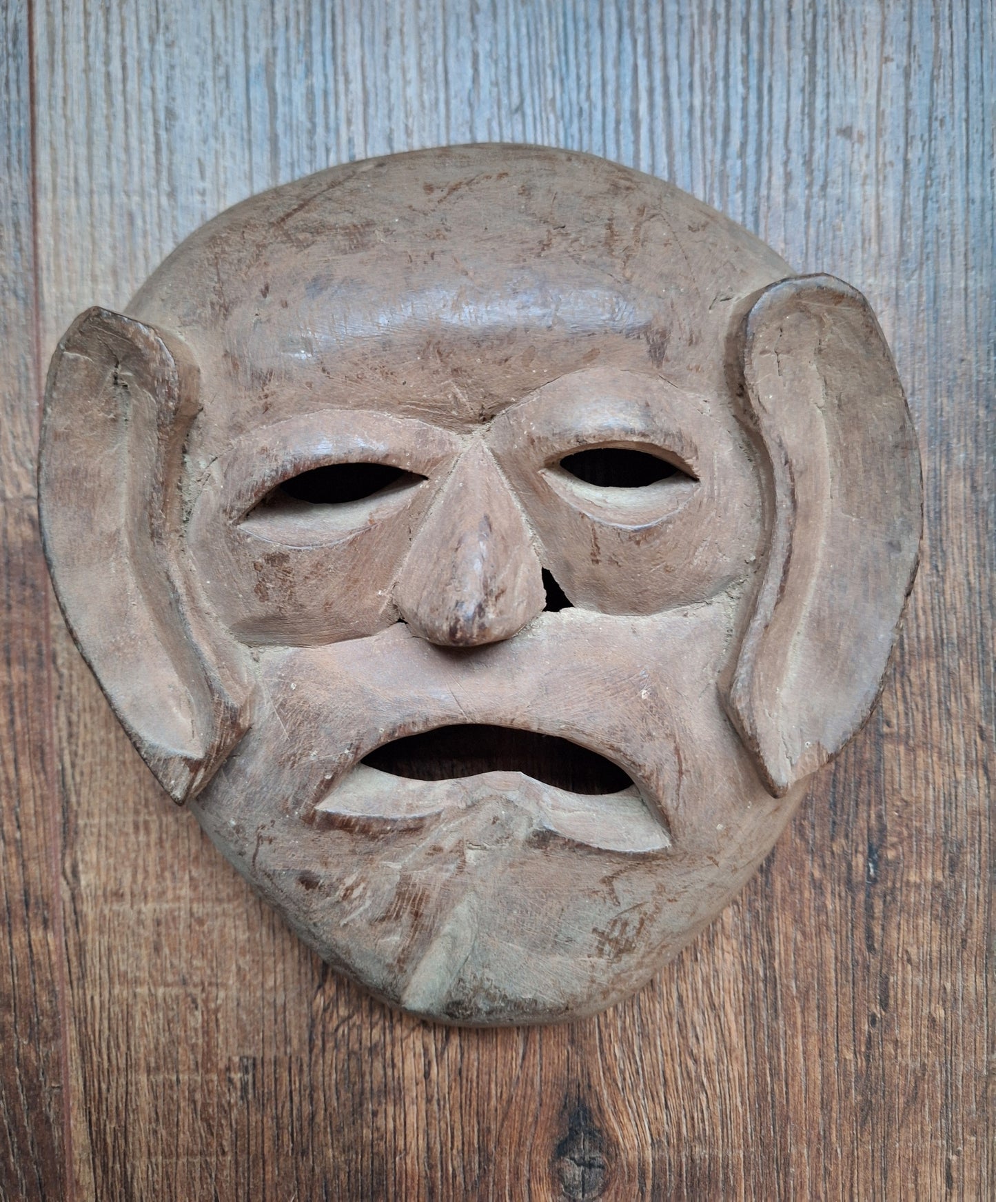 Vintage wooden Tharu tribal festival mask