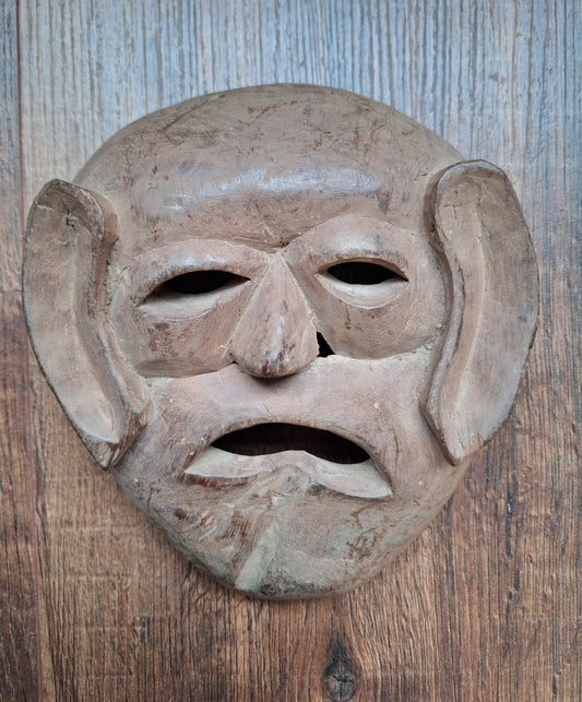 Vintage wooden Tharu tribal festival mask