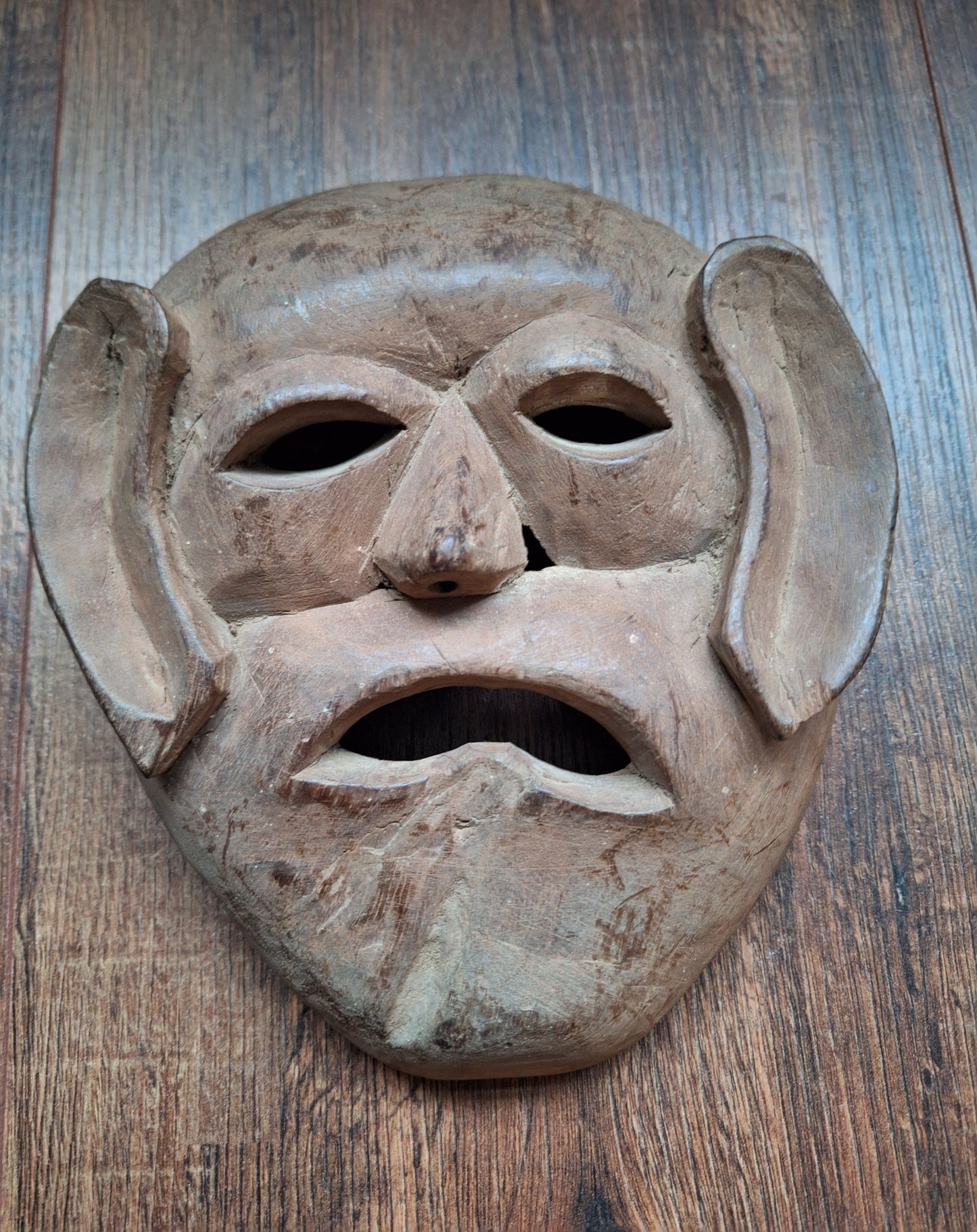 Vintage wooden Tharu tribal festival mask