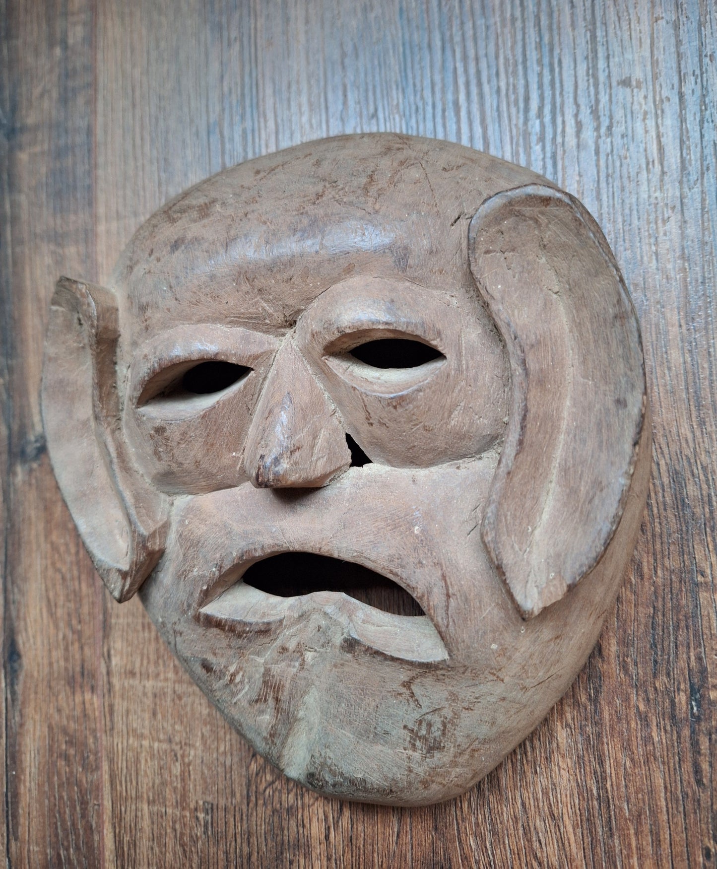 Vintage wooden Tharu tribal festival mask