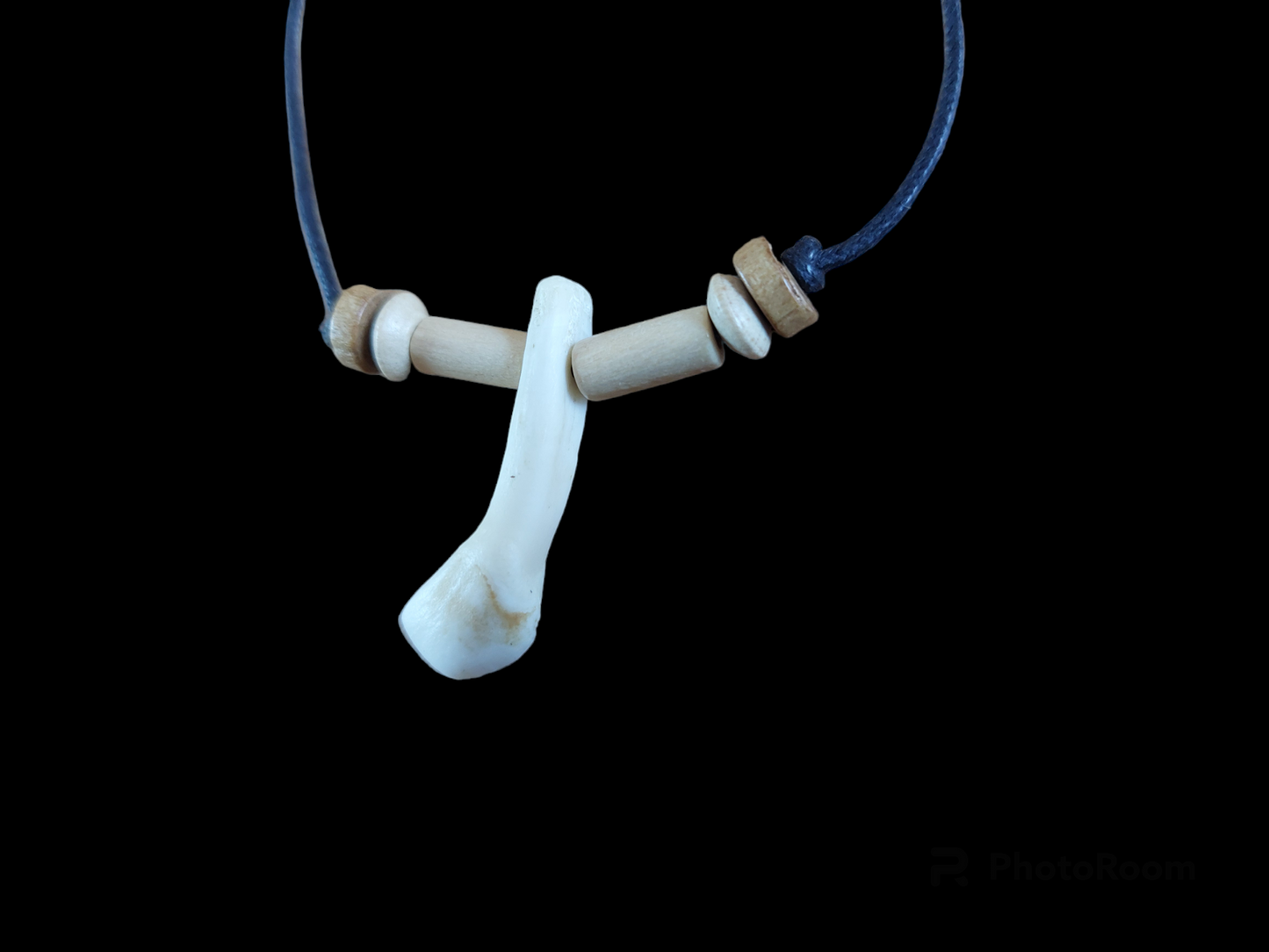 Cow tooth amulet necklace