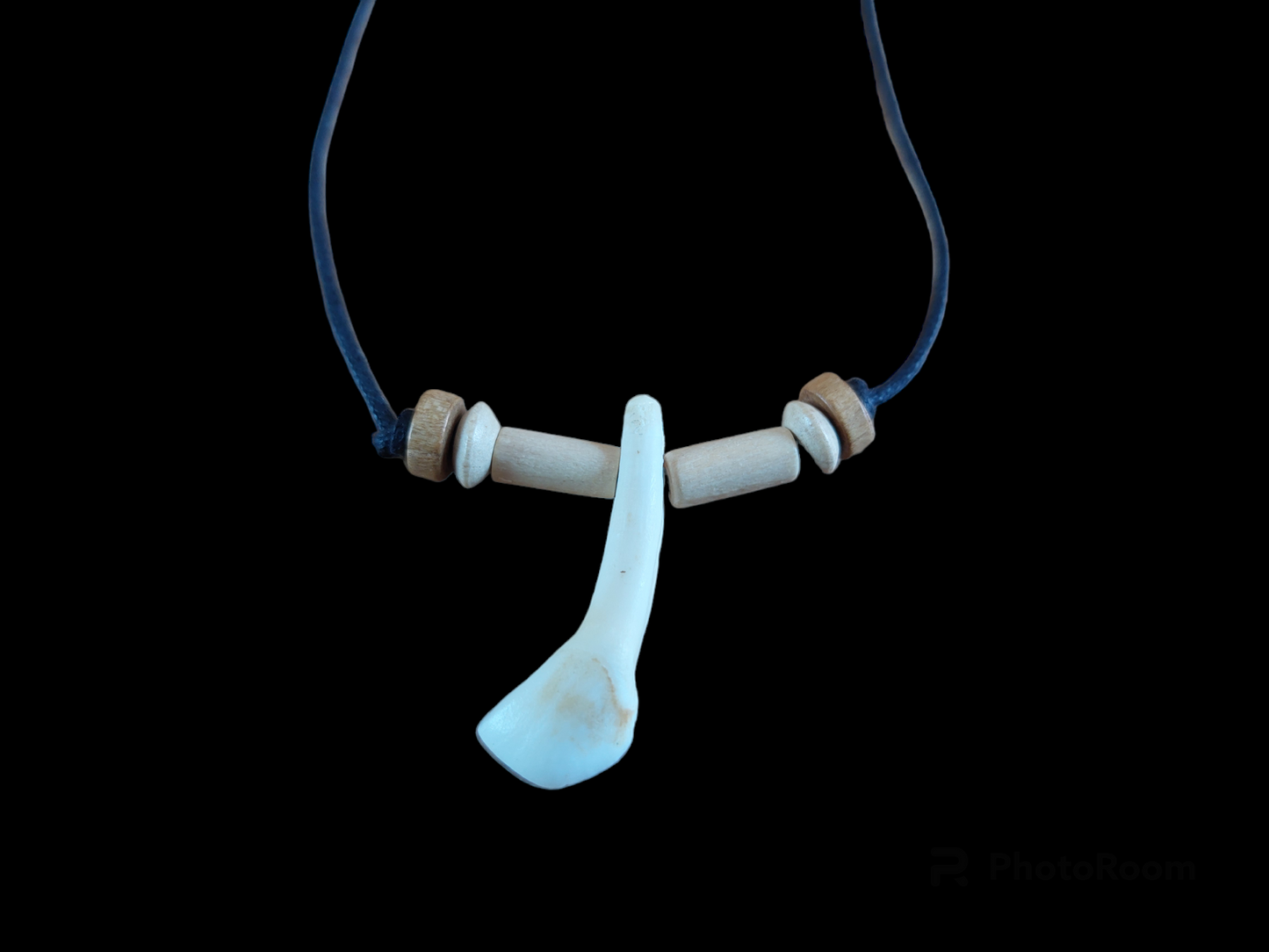 Cow tooth amulet necklace