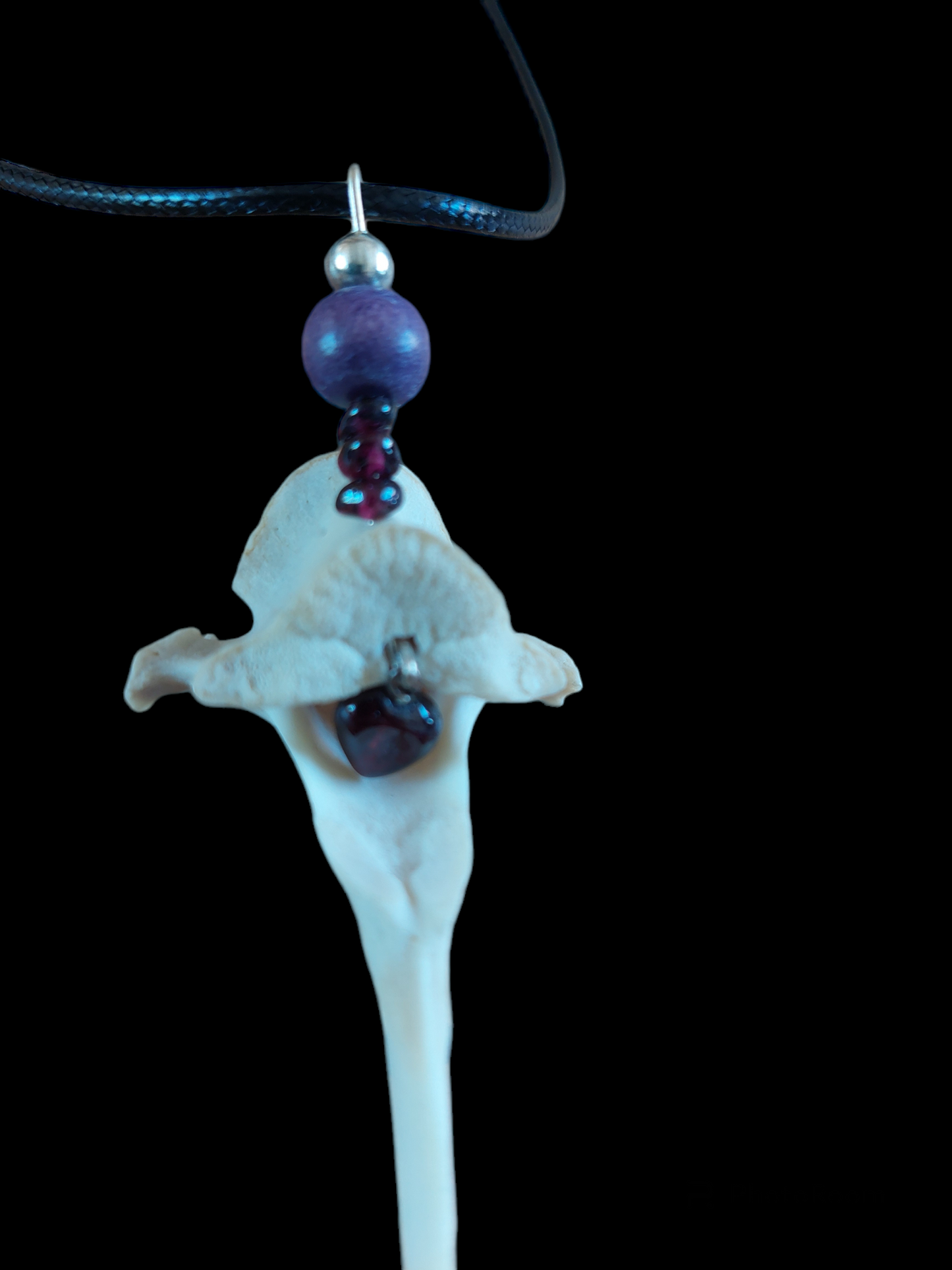 Roe deer vertebra and garnet amulet necklace