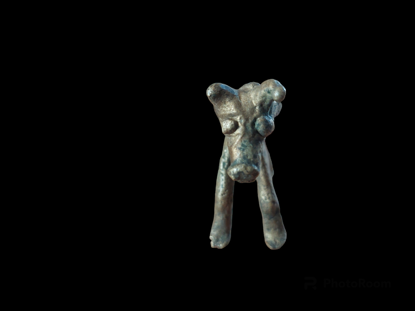 Antique cow figurine
