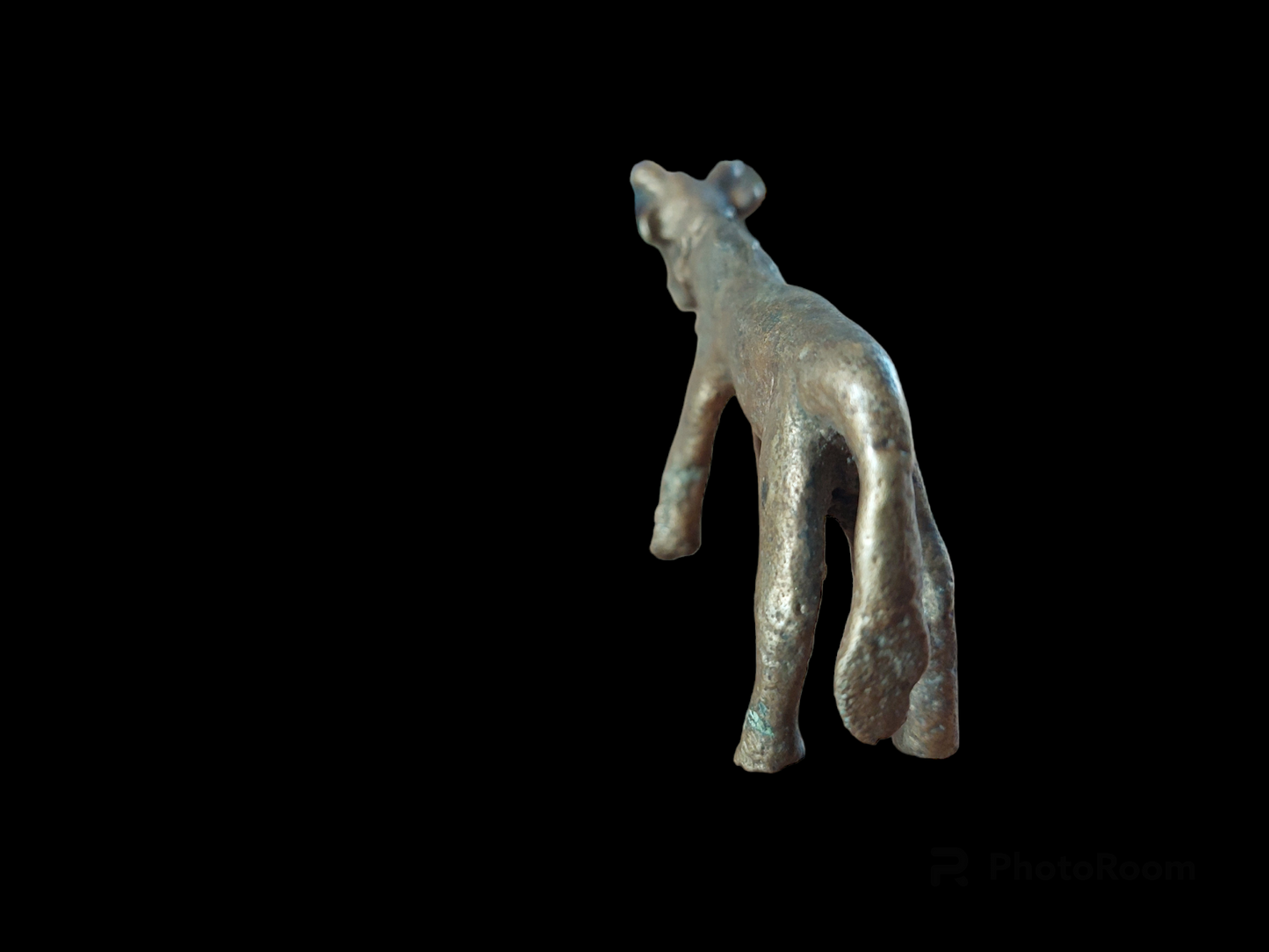 Antique cow figurine