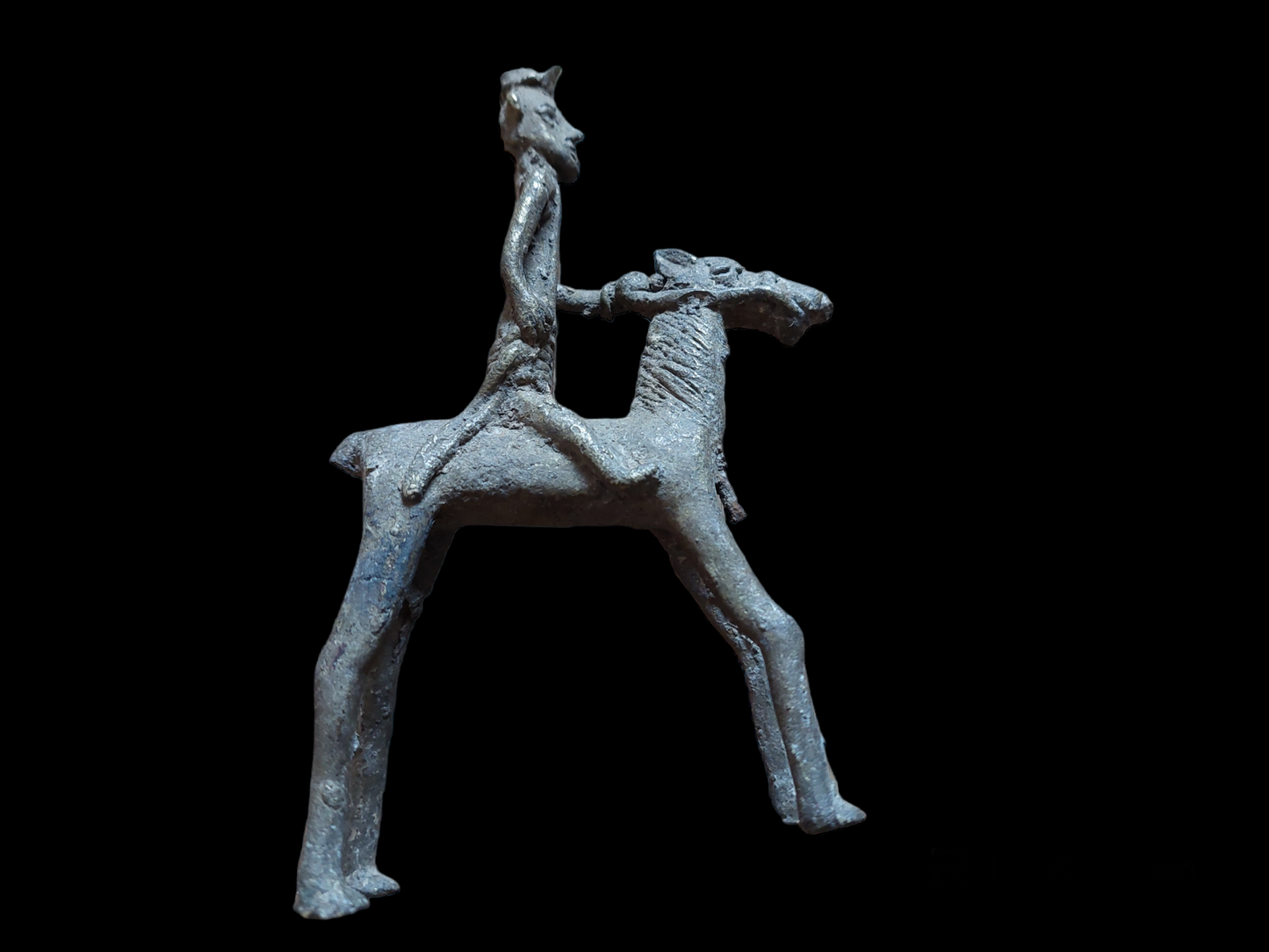 Antique figurine of a warrior on horse