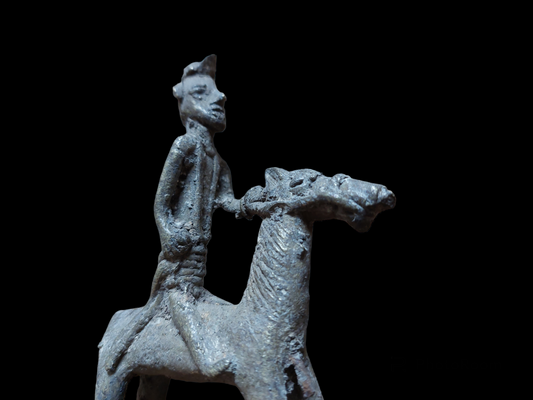 Antique figurine of a warrior on horse