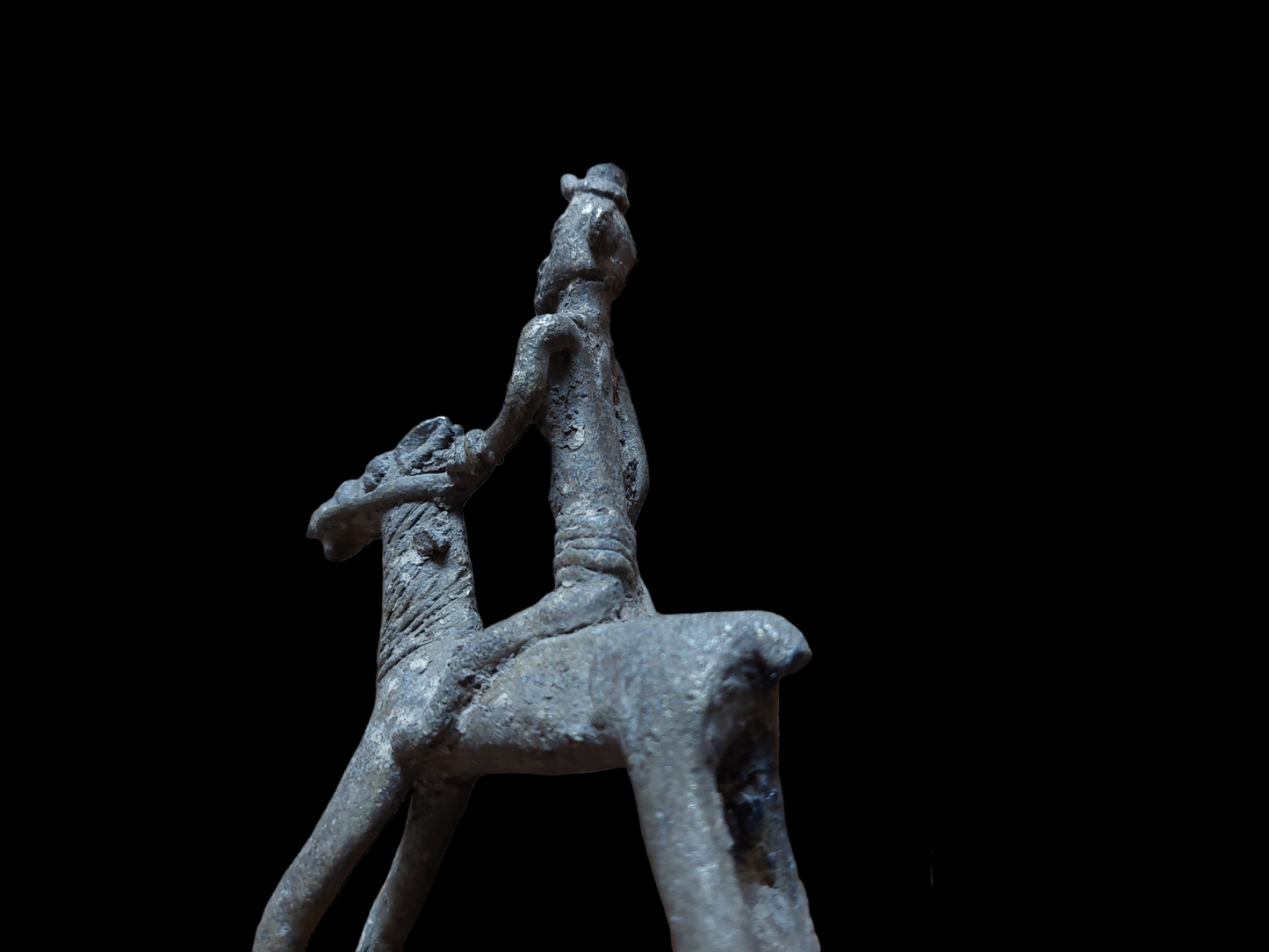 Antique figurine of a warrior on horse