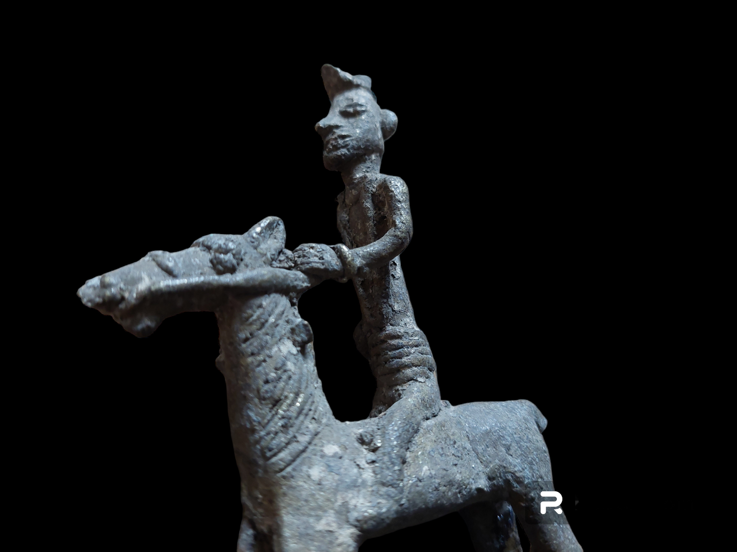 Antique figurine of a warrior on horse