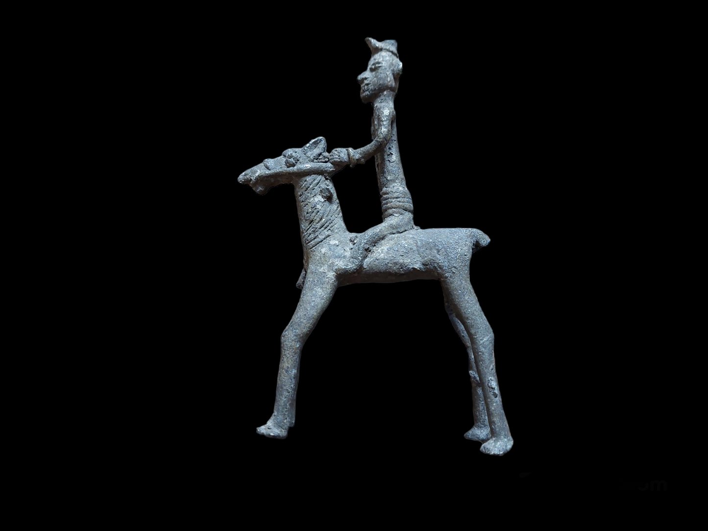 Antique figurine of a warrior on horse