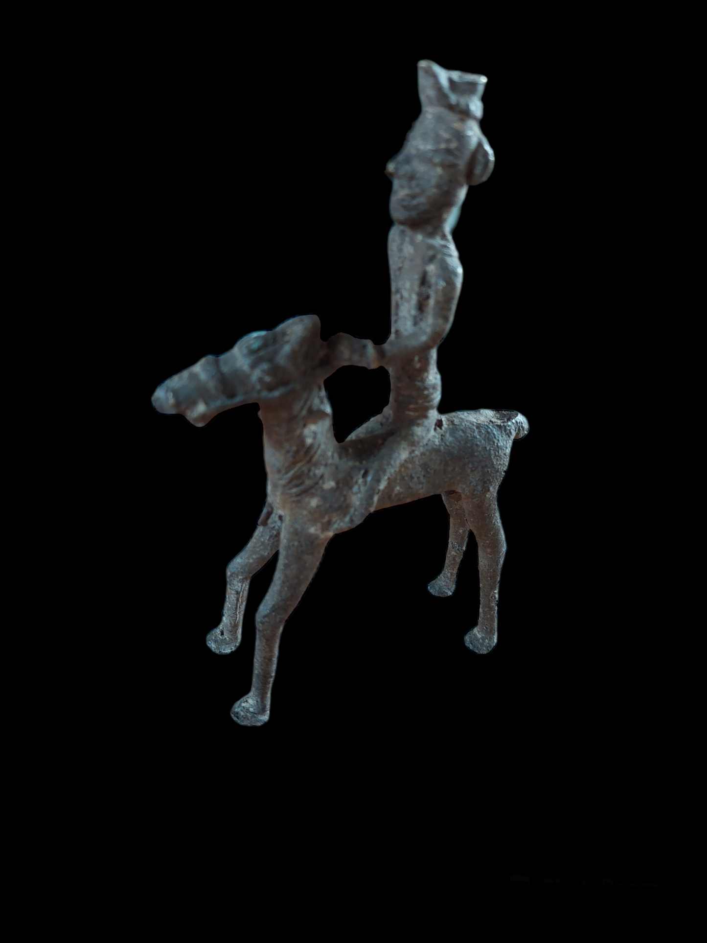 Antique figurine of a warrior on horse