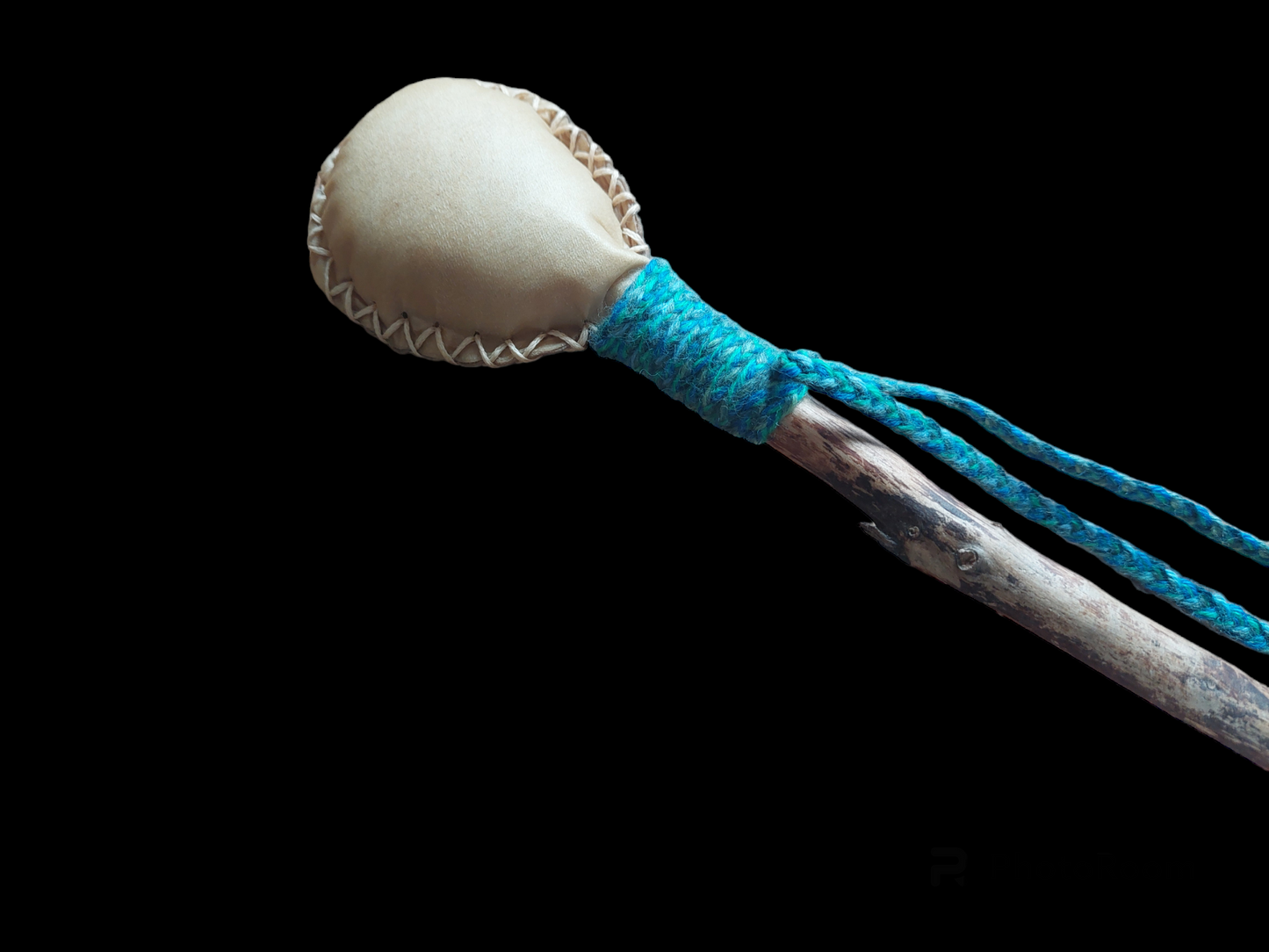 Goat hide and pine wood rattle