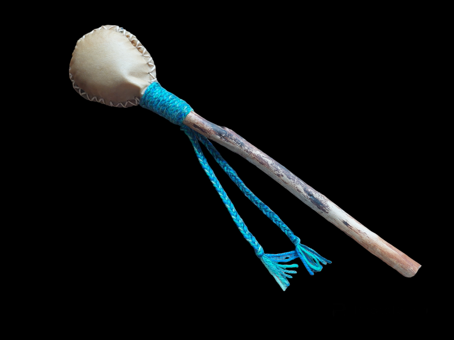 Goat hide and pine wood rattle