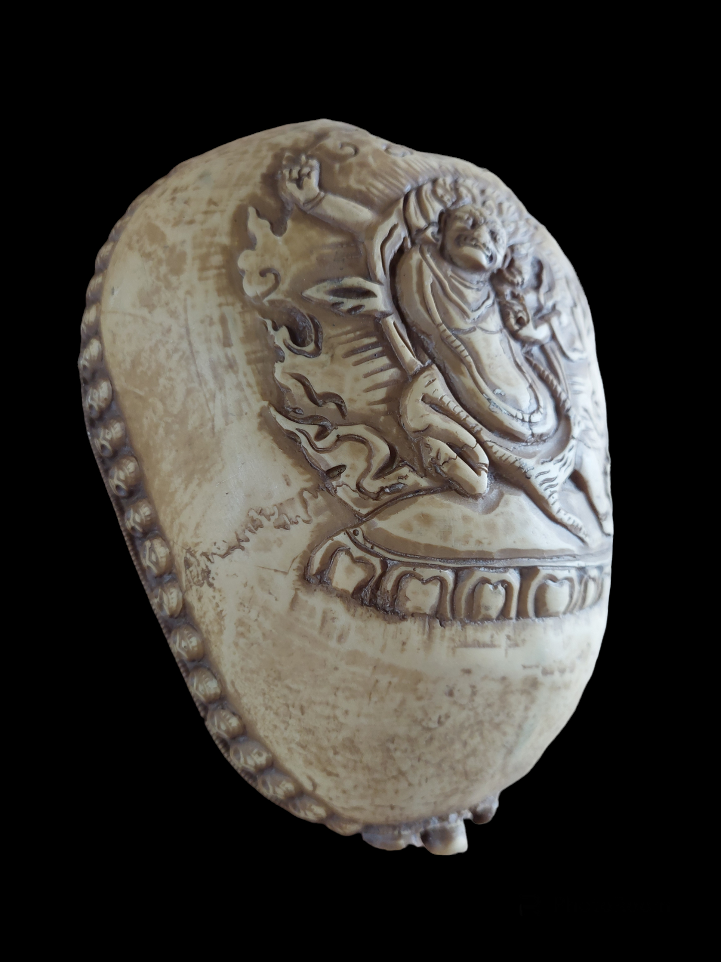 Kapala with wrathful deity depiction