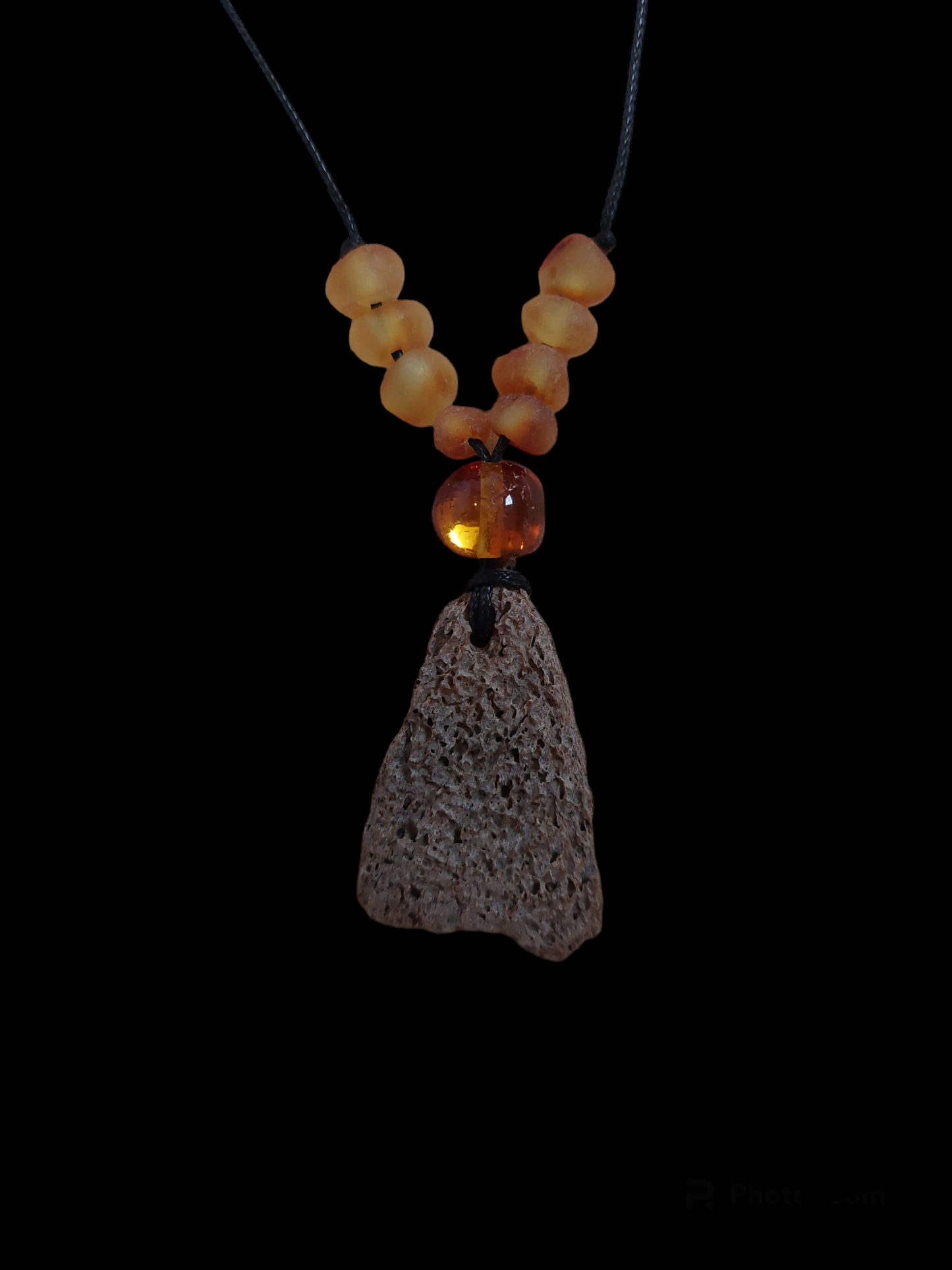 Engraved fossilized bone and amber amulet necklace #1