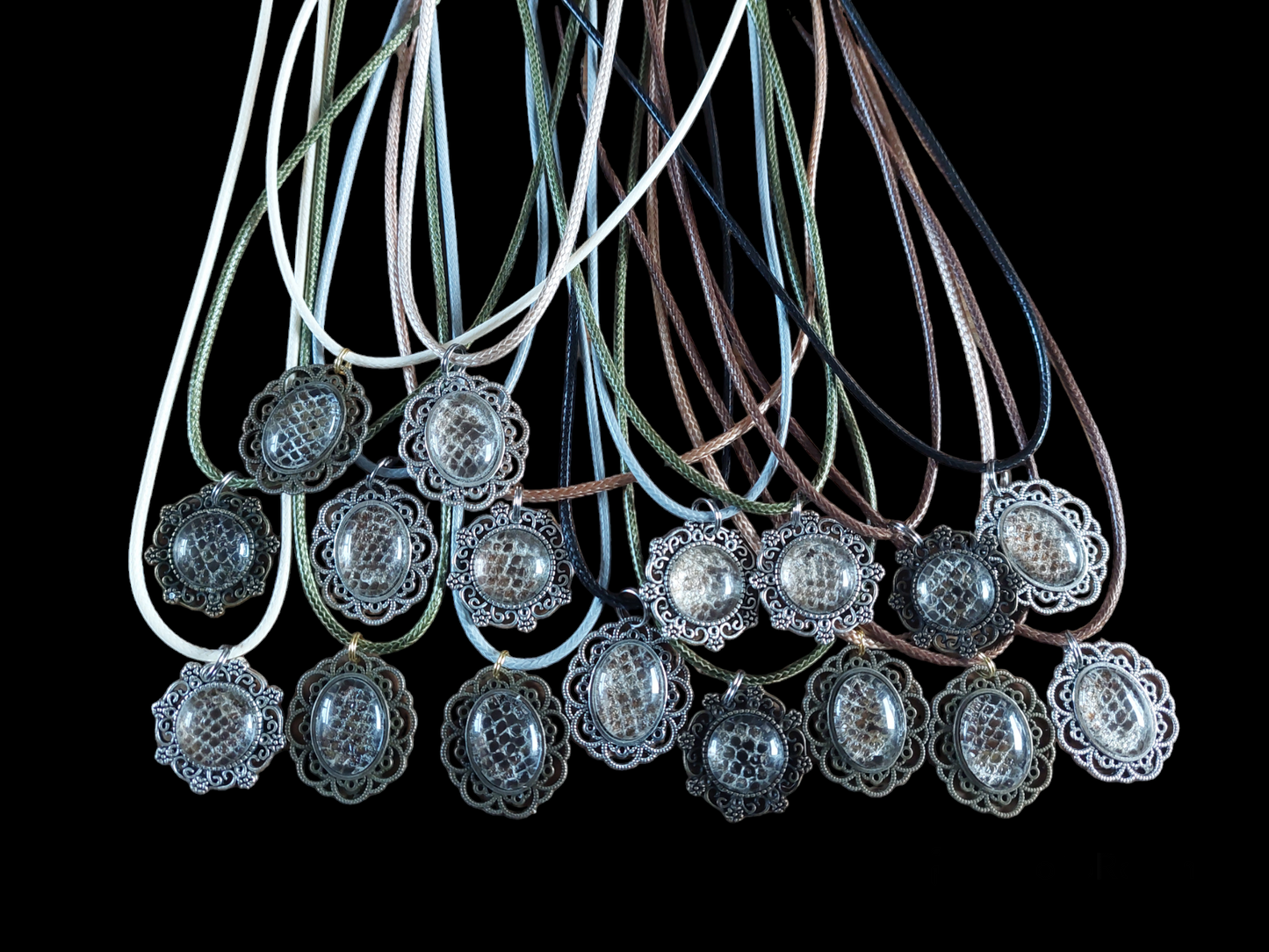 Constrictor snake skin amulet necklace