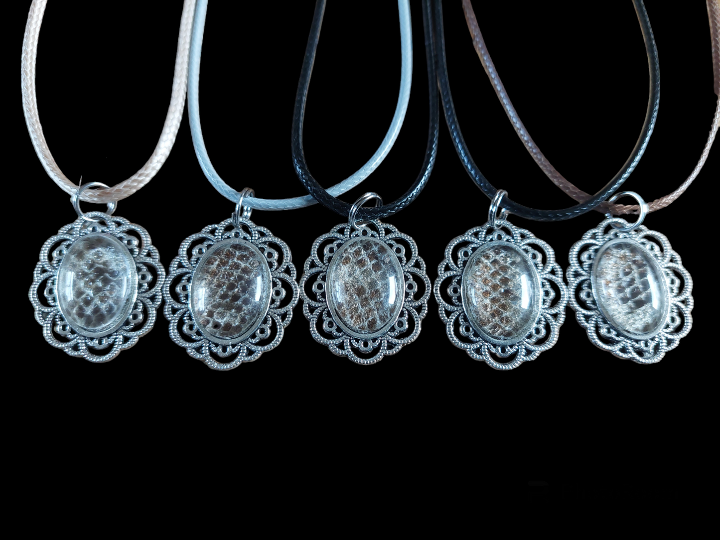 Constrictor snake skin amulet necklace