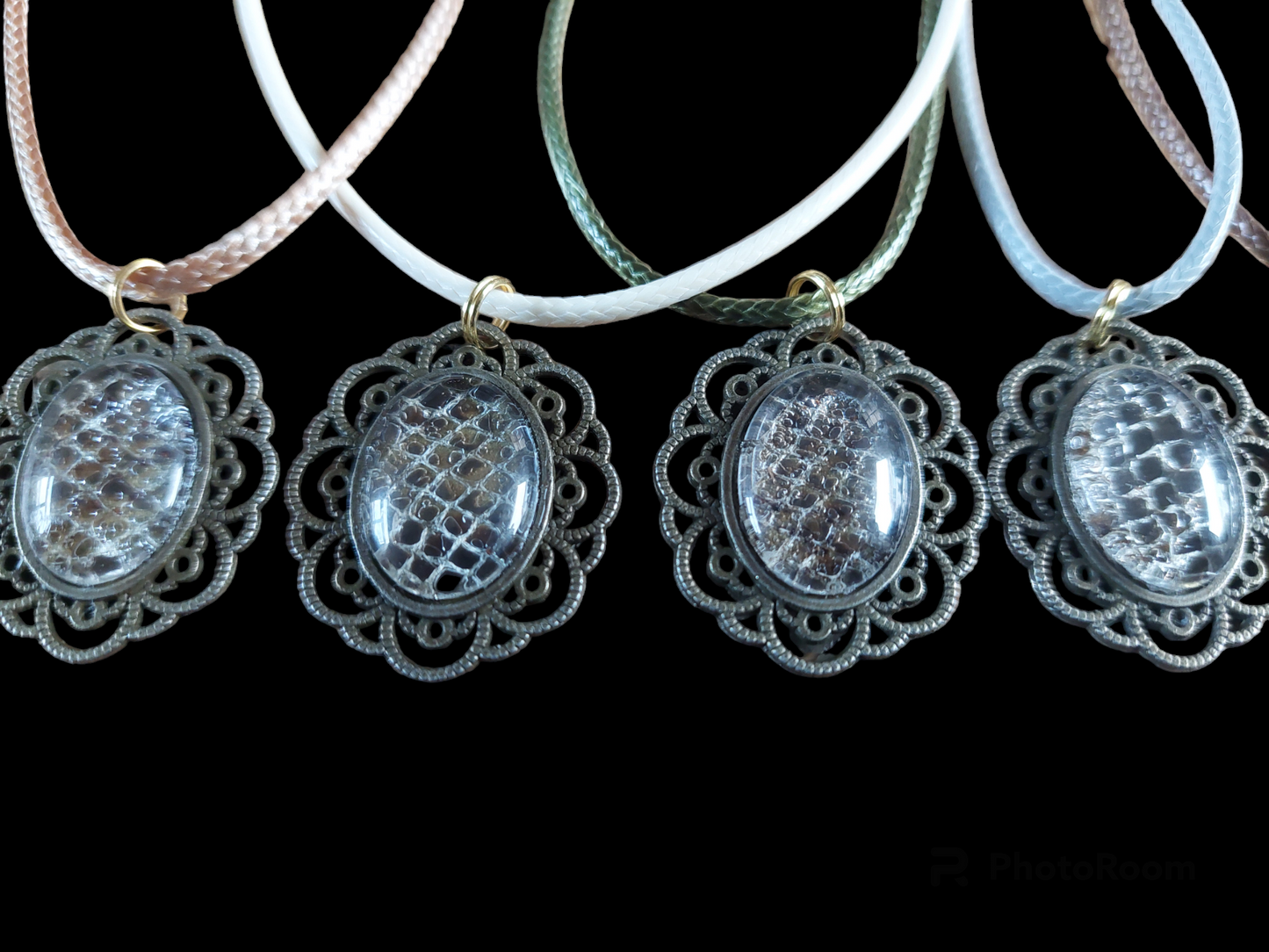 Constrictor snake skin amulet necklace