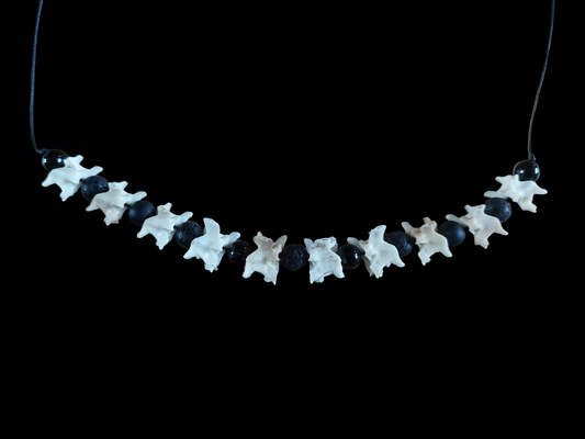 Grass snake vertebrae with obsidian and lava stone amulet necklace