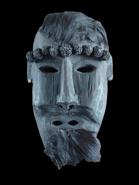 Antique Nepalese wooden mask with rudraksha and yak hide