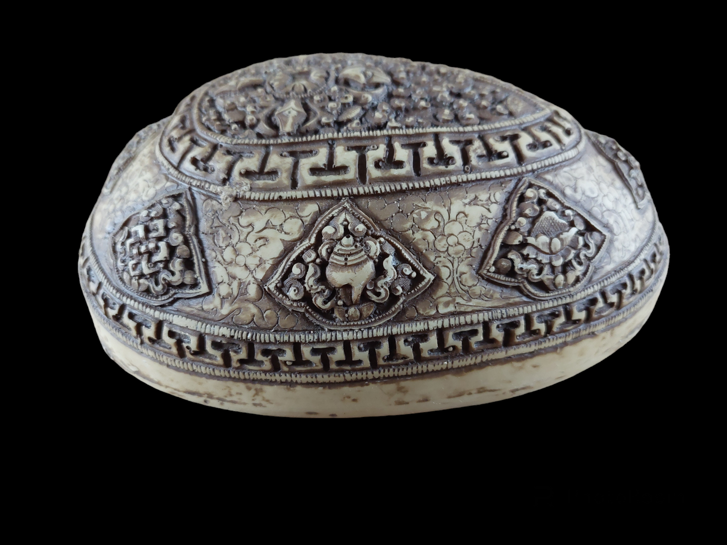 Kapala with auspicious symbols and double dorje depiction