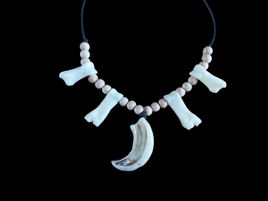 Wild boar tusk and foot bones amulet necklace