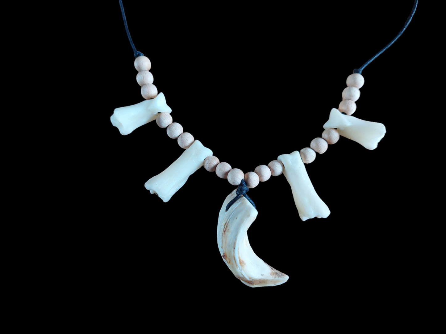 Wild boar tusk and foot bones amulet necklace