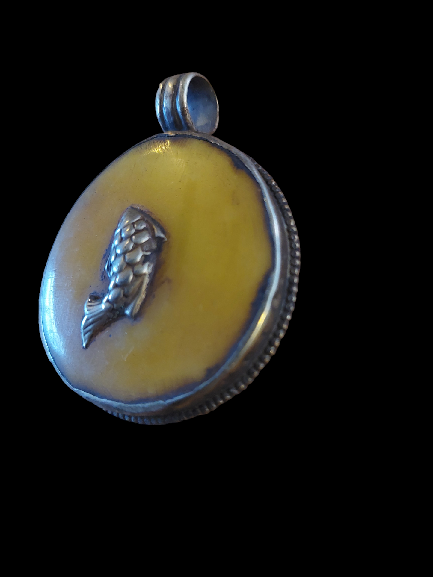 Vintage Tibetan silver and beeswax amber pendant