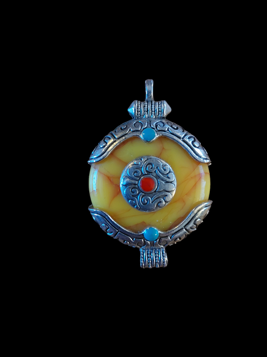 Tibetan silver and beeswax amber pendant