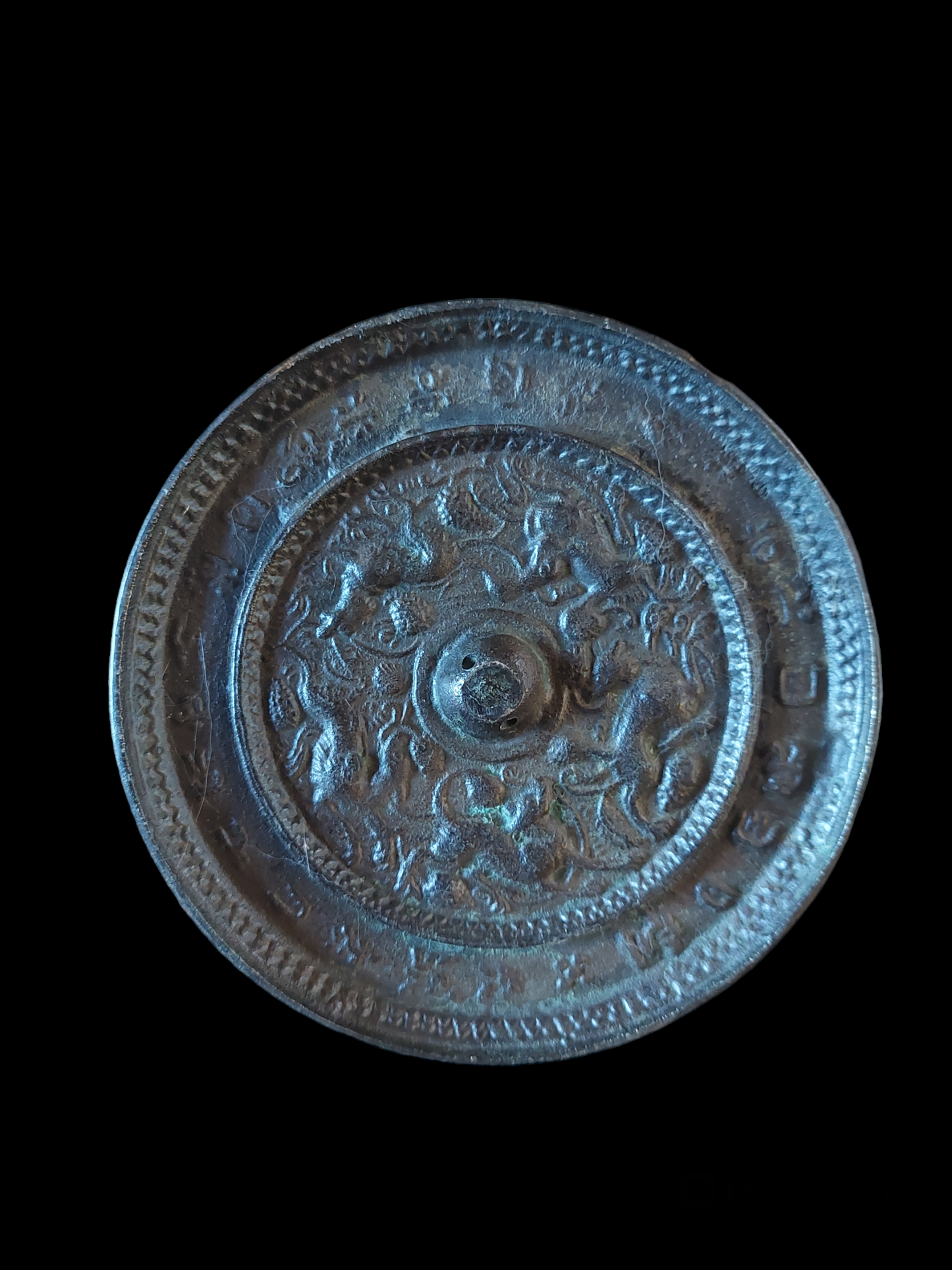 Antique Chinese bronze shamanic mirror Sea Beasts and Grapes 120 millimeter